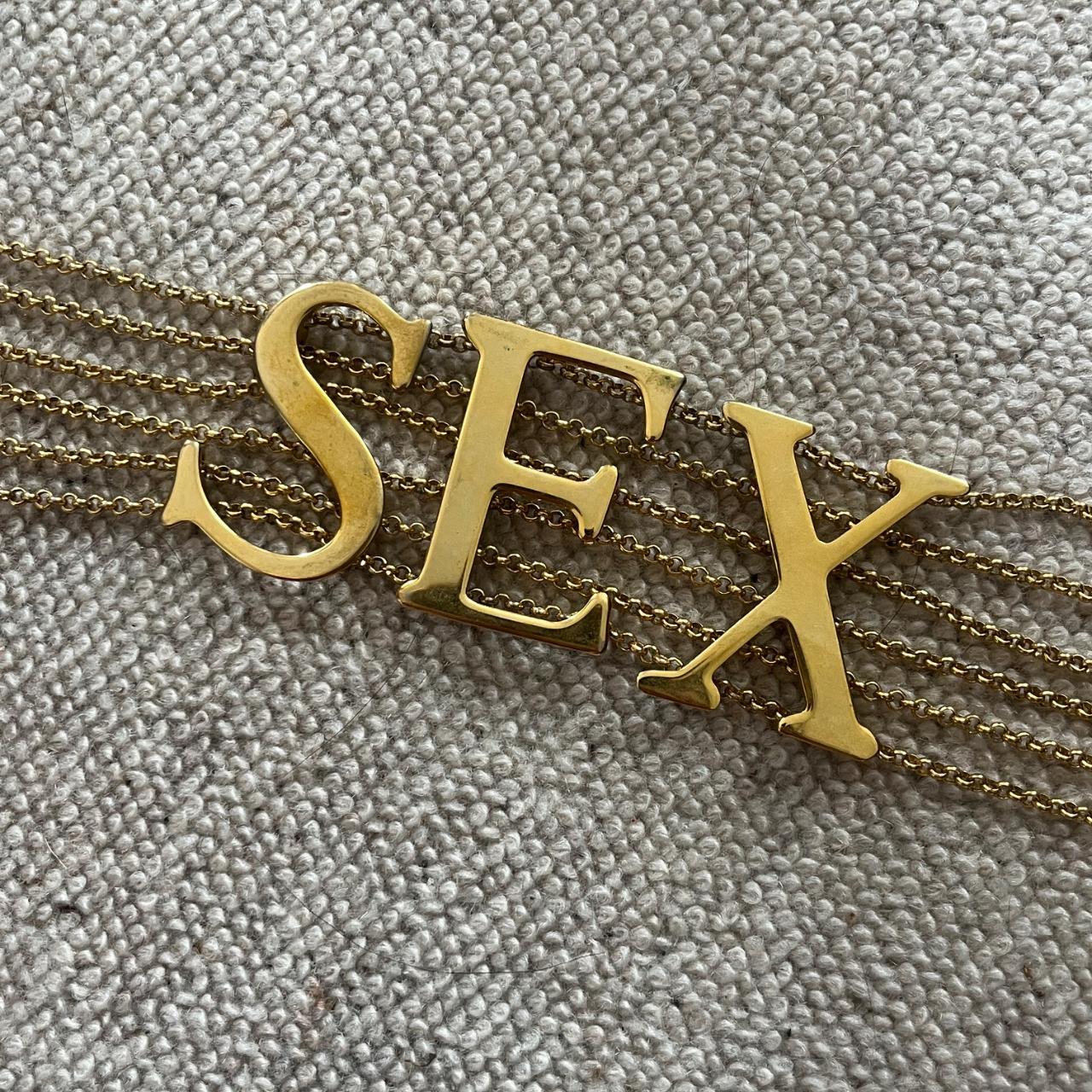 S/S 2003 DOLCE &
GABBANA "SEX" CHOKER
NECKLACE